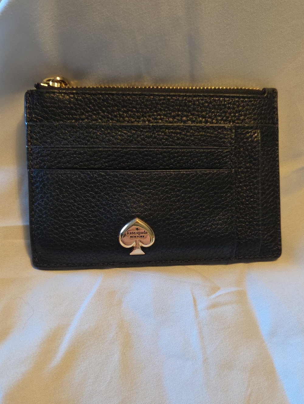 kate spade Black Pebbled Leather Card Case with Spade Emblem